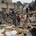 Kinderen staan in het puin na aardbeving in Syrië 